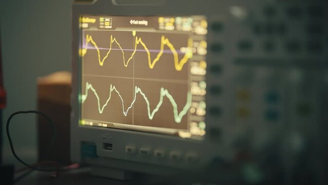 Zoom into oscilloscope as it displayswaves on screen