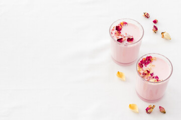 Pink matcha latte coffee or tea with milk, top view