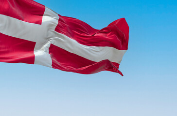 Denmark national flag waving in the wind on a clear day.
