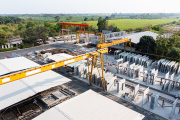 Aerial top view of Precast concrete wall panel for construction building site in warehouse factory....
