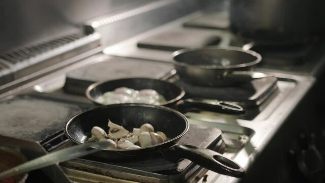 Cooking in Wok Pan Asian Food Professional Restaurant Kitchen