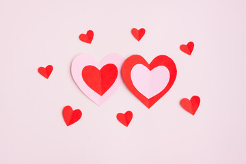 Fototapeta na wymiar Red and Pink Paper Hearts on pink background, Heart shape papercut , Happy Valentine's day