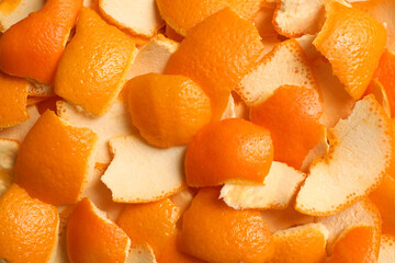 Many orange peels preparing for drying as background, closeup