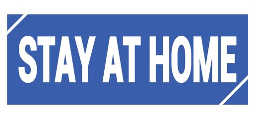 STAY AT HOME text written on blue stamp sign.
