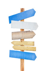 Colorful wooden direction arrow signs on a wooden pole - obrazy, fototapety, plakaty