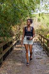 Indonesia, Bali, Female tourist walking on footbridge