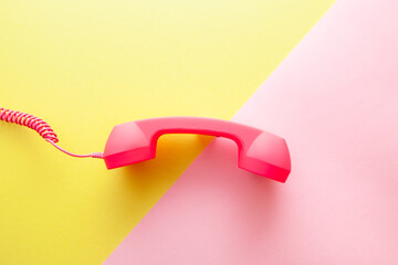 Phone or handset on yellow and pink background, stylish vintage card with communication and...
