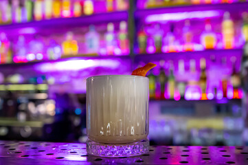 cocktail in glass on the bar.