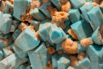 Microcline Mineral Of Feldspar. Amazonite Rock With Teal (Blueish Green) And Pale Orange Colors. 