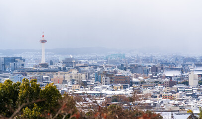 Fototapeta na wymiar Kyoto City skyline panoramic view with snow in winter.