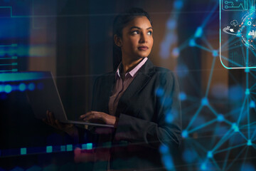 Digitally enhanced shot of a  technician/businesswoman working with virtual reality projection