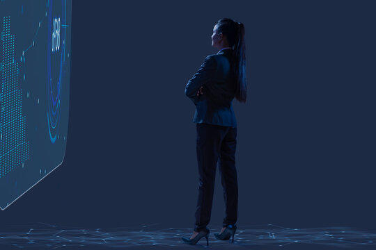 Digitally enhanced shot of a  technician/businesswoman working with virtual reality projection