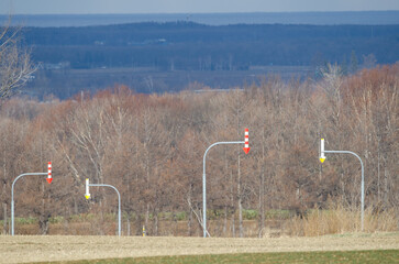 Fototapeta na wymiar landscape with traffic signs in Kiyosato. Okhotsk Subprefecture. Hokkaido. Japan.