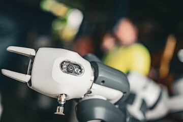 Engineer training skills with the new robotics machine in Factory