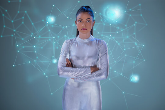 A woman wearing silver futuristic clothes with virtual icons in the background , future technology concept
