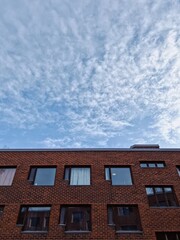 Bright sky over brick building