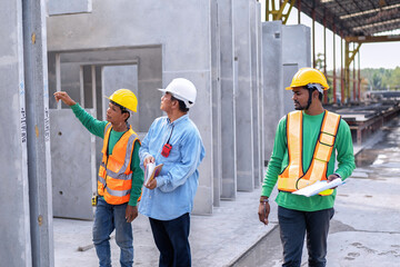 At building construction site supervisor check quality precast concrete panel before installation