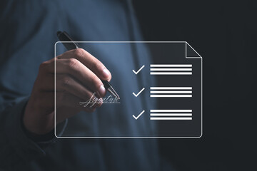 Electronic signature Signing electronic documents on digital documents Online, businessman holding...