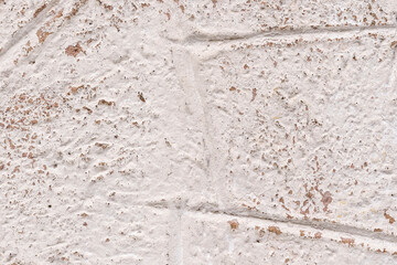 Old uneven painted exterior wall of the building