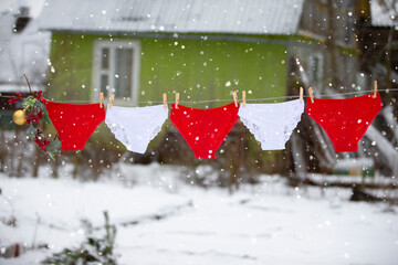 In winter, panties dry on a rope outside.
