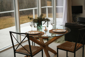 served glass round table in a house with a beautiful modern interior