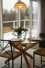 served glass round table in a house with a beautiful modern interior