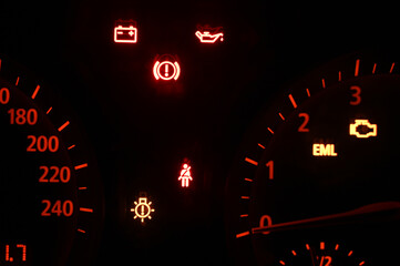 Warning lights on dashboard in the car. Red and orange warning lights in vehicle.