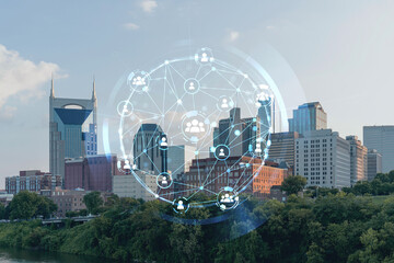 Panoramic skyline view of Broadway district of Nashville over Cumberland River at day time,...