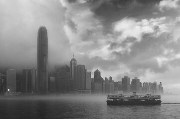 Scenery of Victoria Harbour of Hong Kong city in fog