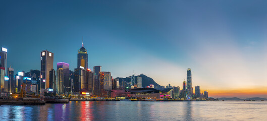 Panorama of Victoria harbor of Hong Kong city under sunset
