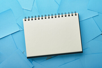 Blue paper stickers on black background. Sticky notes blank with copy space ready for your message....