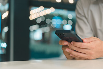 male hands using smartphone with copy space, searching or social networks concept, digital technology online, internet connection.