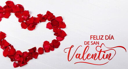 tarjeta o pancarta para desear un feliz Día de San Valentín en rojo sobre un fondo blanco con un corazón formado por pétalos de rosas rojas