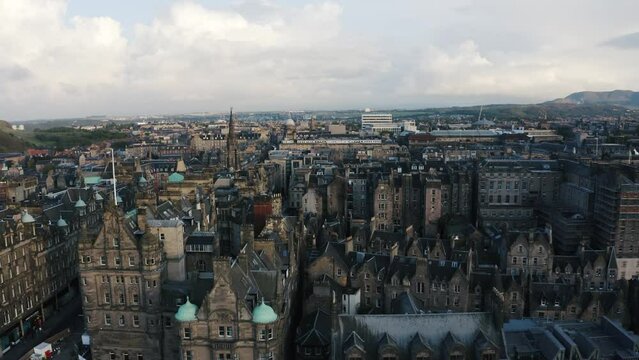 Establishing aerial view of Edinburgh's old gothic architecture sprawling throughout the downtown area.