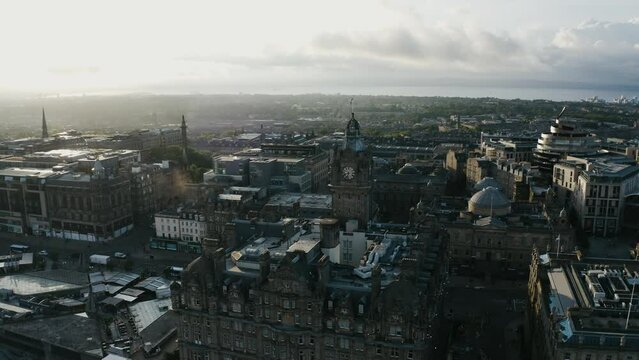 Wide aerial view of The Balmoral clock tower in Scotland, surrounded by historic architecture.