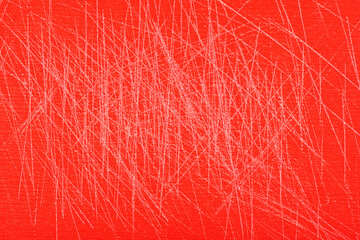 Plastic chopping board with visible knife cuts.