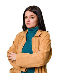Young caucasian woman isolated unhappy looking in camera with sarcastic expression.