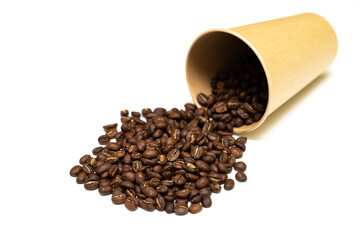 scattered from a glass of coffee grains on a white background