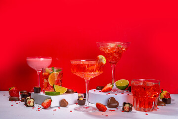 Valentine day romantic bar background. Set various red, pink, chocolate alcohol drinks for...