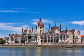 Fototapeta premium Budapest, Hungary - July 04, 2022: View of Hungarian Parliament Building, Royal Palace and Danube river.