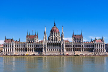 Fototapeta na wymiar Budapest, Hungary - July 04, 2022: View of Hungarian Parliament Building, Royal Palace and Danube river.