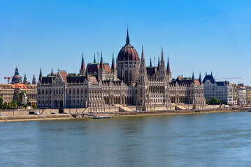 Fototapeta na wymiar Budapest, Hungary - July 04, 2022: View of Hungarian Parliament Building in Budapest,