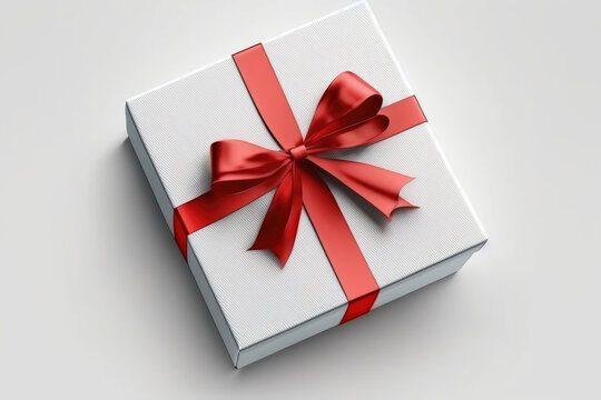 Valentines Gift box with red ribbon on white top view 