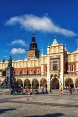 Fototapeta na wymiar Sukiennice building with Town Hall in the background
