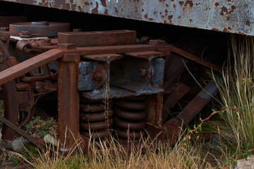 Rusty scrap in an old train junkyard