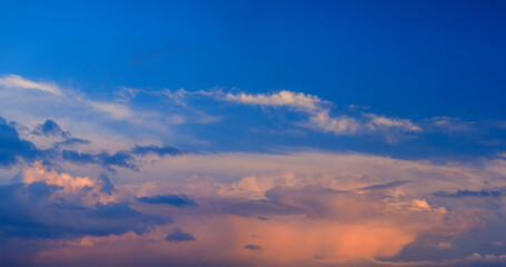 Fototapeta premium Cloudy sky at sunset. Pink clouds