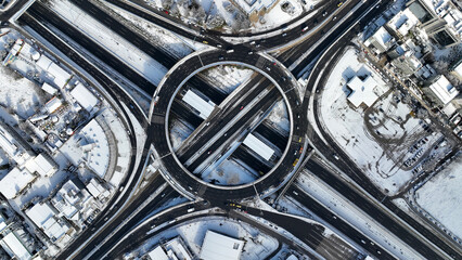 Aerial drone photo of snowed ring road in Kifisias and Attiki odos avenues, a popular multilevel junction circular road during winter time, Attica, Greece