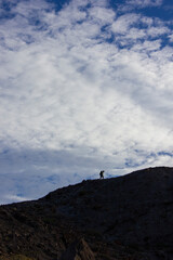 Person hiking a mountain