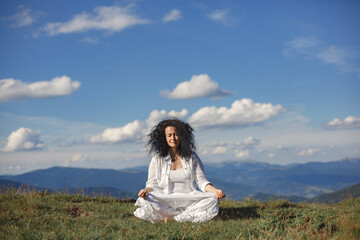 Adult yoga woman on the nature