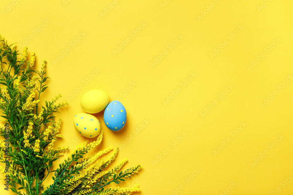 Poster easter eggs and spring flowering twigs. flat lay with place for text and copy space